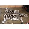 Image 2 : ZEBRA Hide Rug with Carpet Backing and Leather Piping