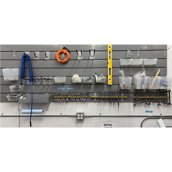 Contents of Wall Organizer: Assorted Combination Wrenches, Fish Tape, Level, Markers & Small Hardwar