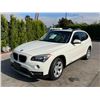 Image 1 : BMW  X1 2014 T-SMOG