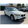 Image 2 : BMW  X1 2014 T-SMOG
