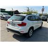 Image 3 : BMW  X1 2014 T-SMOG
