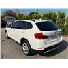 Image 4 : BMW  X1 2014 T-SMOG