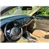 Image 5 : BMW  X1 2014 T-SMOG