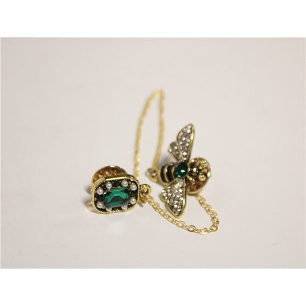 16)  GOLD TONE WITH GREEN & CLEAR CZ