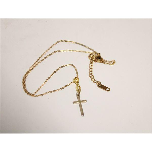 23)  GOLD TONE CROSS ON 18" CHAIN.
