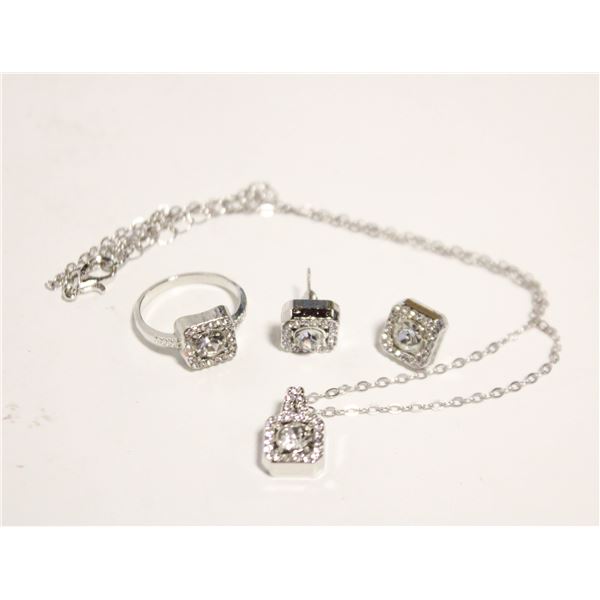 18)  SILVER TONE WITH CLEAR CZ SET OF