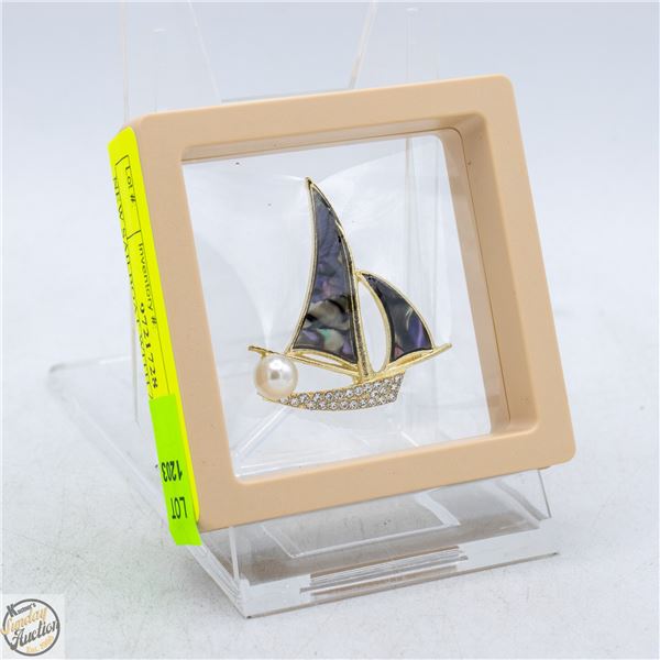 NEW SAILBOAT WITH ABALONE SHELL