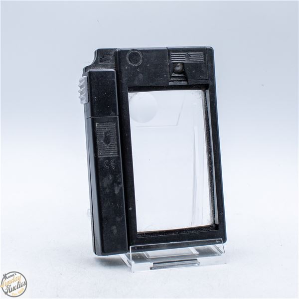 VINTAGE ILLUMINATED POCKET MAGNIFYING GLASS