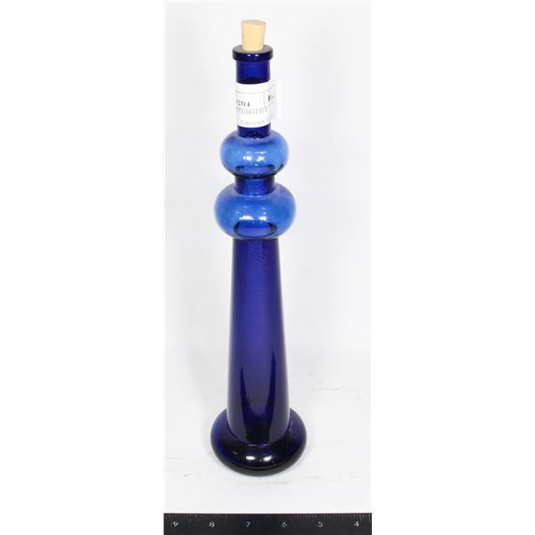 BLUE GLASS TINTED BOTTLE
