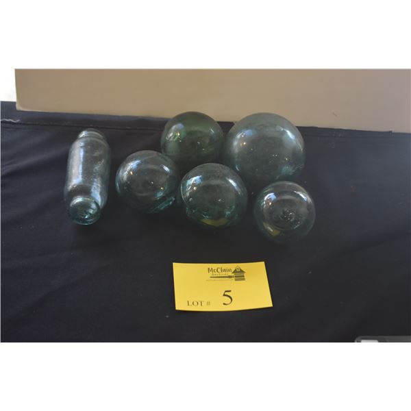 COLLECTION OF GLASS FISHING FLOATS IN LAUHALA BASKET (7 PCS)