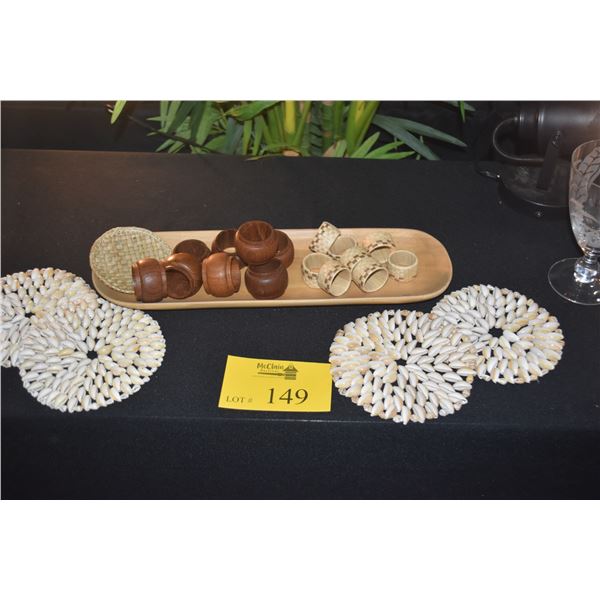 MIXED LOT: COWRIE SHELLS TRIVETS, WOOD & LAUHALA NAPKIN RINGS & MONKEYPOD TRAY (22 PCS)