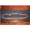 Image 1 : NI'IHAU SHELL LEI, RIBBON STYLE, KAHELELANI AKALA (PINK TURBAN SHELLS) W/COWRIE SHELL CLASP (38") (D