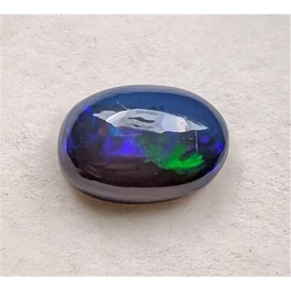 Natural Welo Black Opal 2.45ct Oval Cabochon