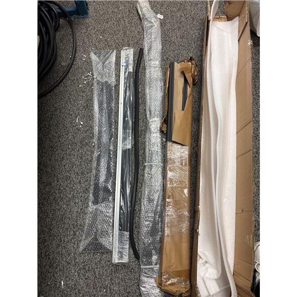 brand new, aluminum roof rack crossbars intended for vehicle rooftops.