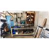 Image 1 : WORK BENCH WITH ASSORTED SHOP ITEMS- HEAVY DUTY CASTERS, BENCH VICE, HOLE SAWS, TOOL BOX,