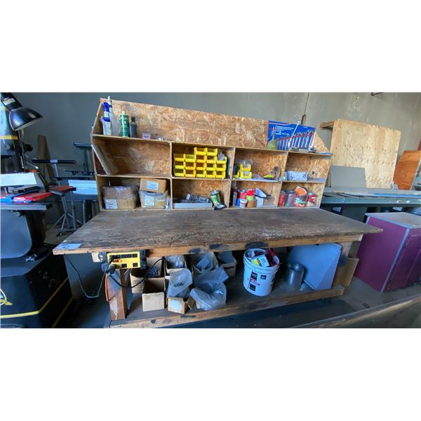 WOODEN MOBILE WORKBENCH WITH ASSORTED SHOP ITEMS- HARDWARE, ELECTRICAL ITEMS, WRENCHES & MORE