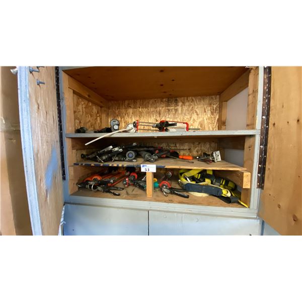 CONTENTS OF UPPER CUPBOARD- LARGE ASSORTMENT OF CAULKING/ADHESIVE GUNS, HARNESS & EZ STOP SHOCK