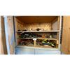 Image 1 : CONTENTS OF UPPER CUPBOARD- LARGE ASSORTMENT OF CAULKING/ADHESIVE GUNS, HARNESS & EZ STOP SHOCK