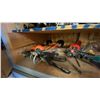 Image 2 : CONTENTS OF UPPER CUPBOARD- LARGE ASSORTMENT OF CAULKING/ADHESIVE GUNS, HARNESS & EZ STOP SHOCK