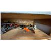 Image 4 : CONTENTS OF UPPER CUPBOARD- LARGE ASSORTMENT OF CAULKING/ADHESIVE GUNS, HARNESS & EZ STOP SHOCK