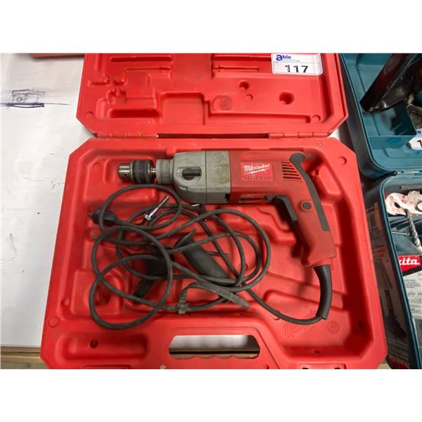 MILWAUKEE HEAVY DUTY ELECTRIC HAMMER DRILL IN HARD TRANSPORT CASE