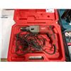Image 1 : MILWAUKEE HEAVY DUTY ELECTRIC HAMMER DRILL IN HARD TRANSPORT CASE