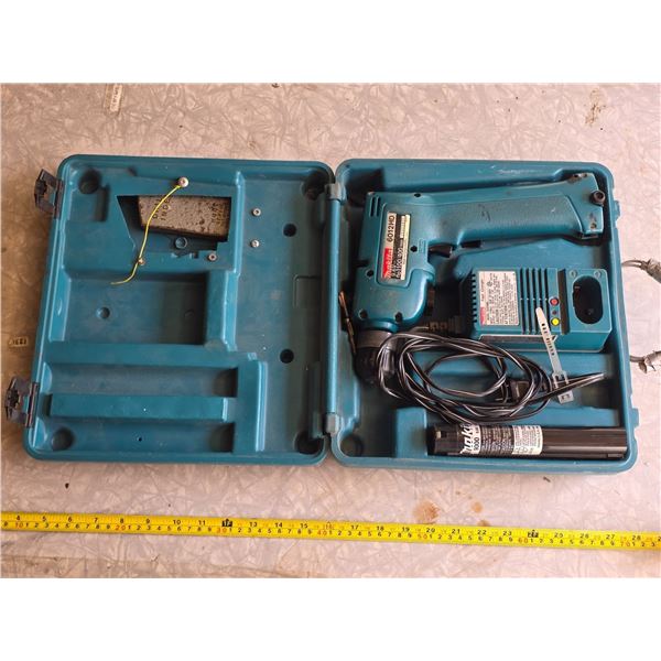 Makita drill with battery and charger also case- untested