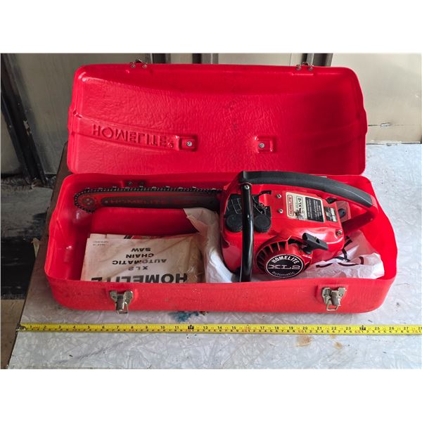 Homelite chainsaw with case- has compression- untested