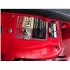 Image 4 : Homelite chainsaw with case- has compression- untested