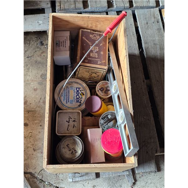 Wood crate full of hardware