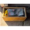 Image 1 : Crate of oil containers- most are half full
