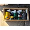 Image 2 : Crate of oil containers- most are half full