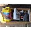 Image 4 : Crate of oil containers- most are half full