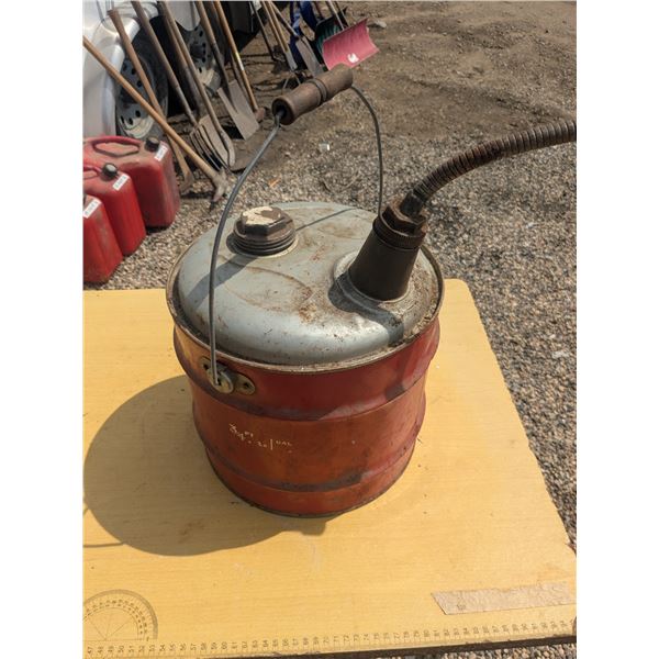 vintage round metal gas can