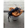 Image 1 : Tarp, bungi cords, garbage