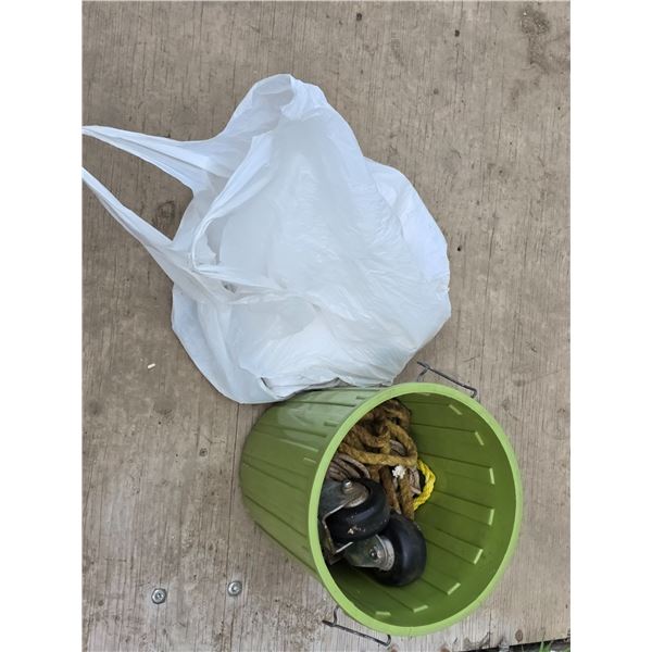 Garbage can, rope, casters