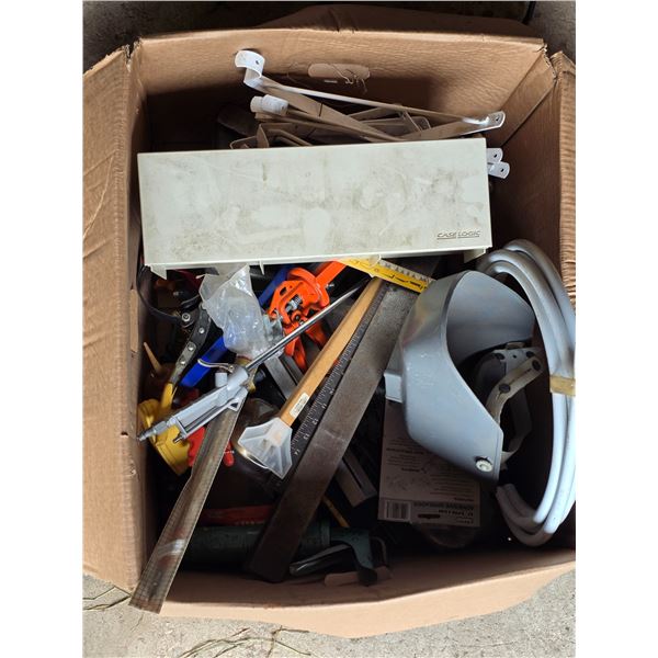 Lot of caulking guns, squares and brackets