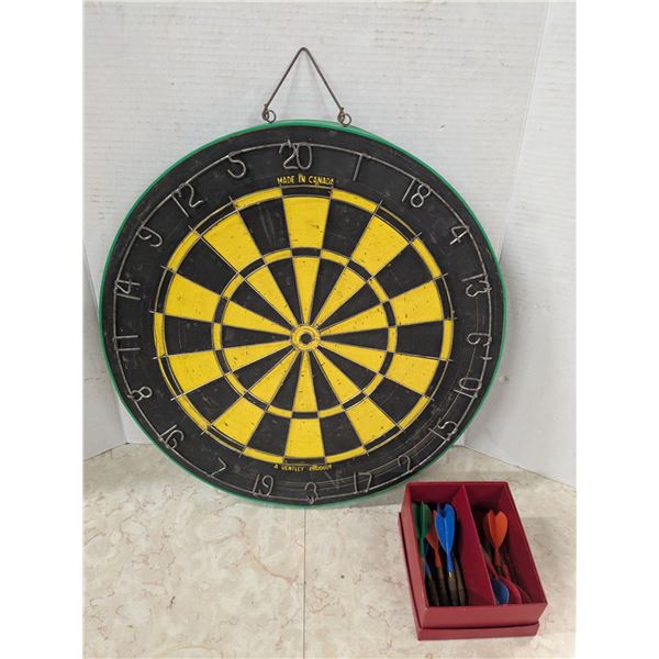 vintage dartboard with darts