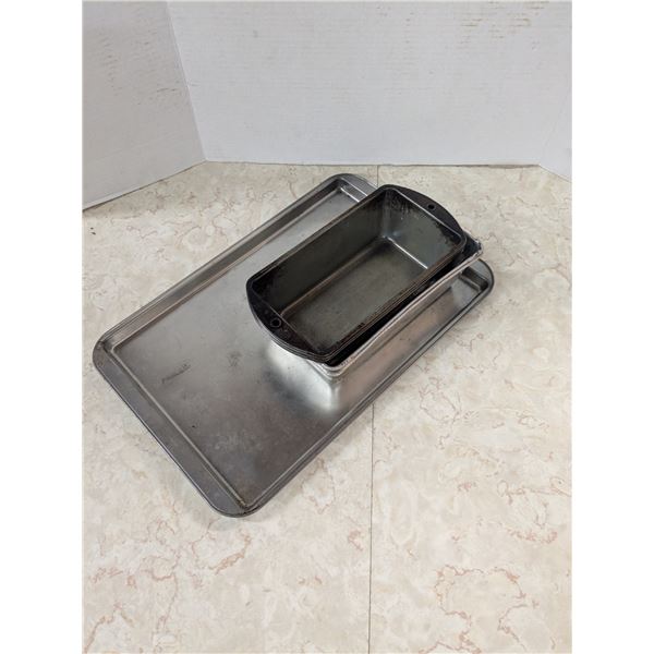5 bread pans and a cookie sheet