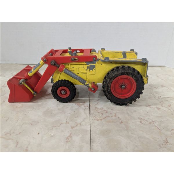 Vintage functioning tractor toy, metal and plastic
