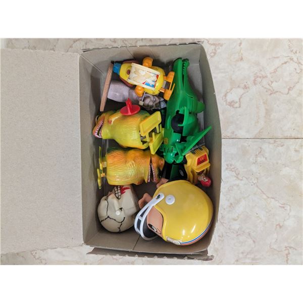 7 plastic wind up toys