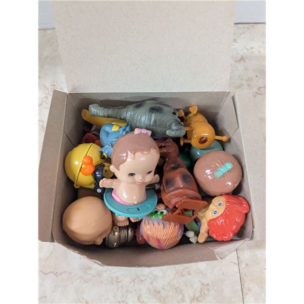 box of smaller wind up toys