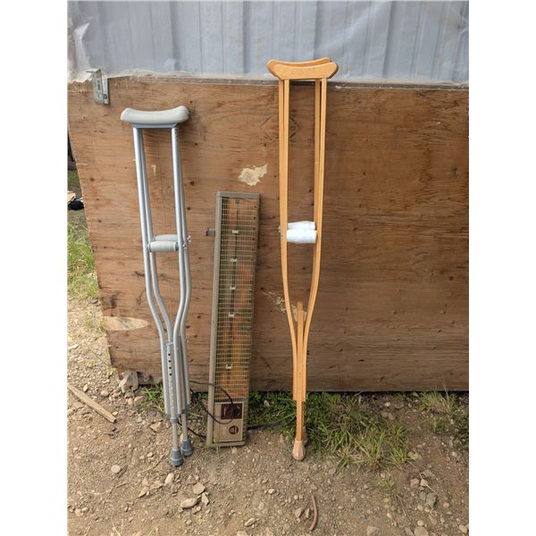 2 pairs crutches and mobile baseboard heater