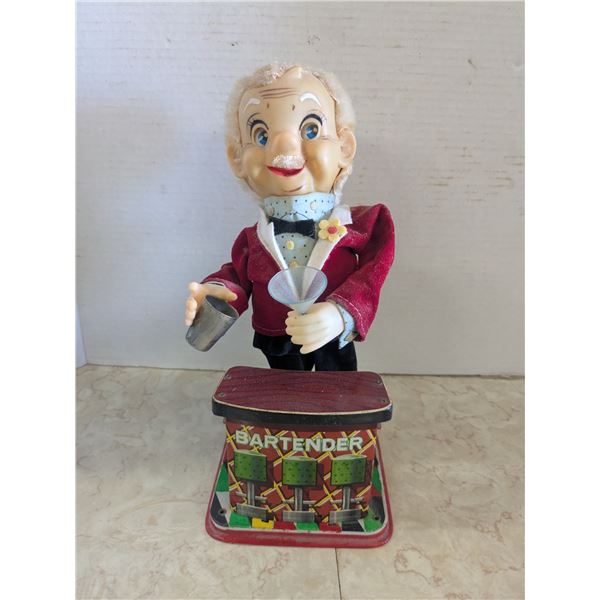 Vintage tin bartender statue