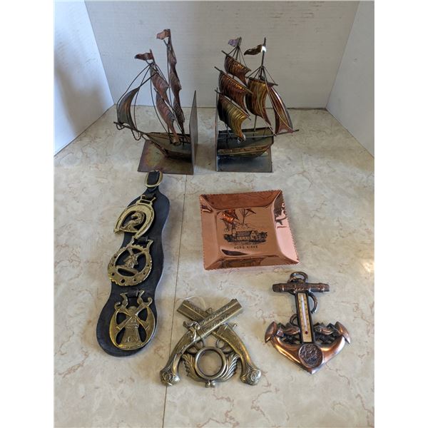 Brass and copper décor, wall hangers, book ends, etc.