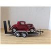 Image 1 : diecast car on trailer