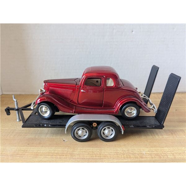 diecast car on trailer