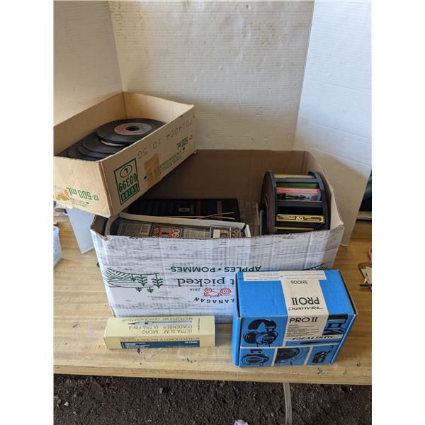 Box of cassettes, records and headphones