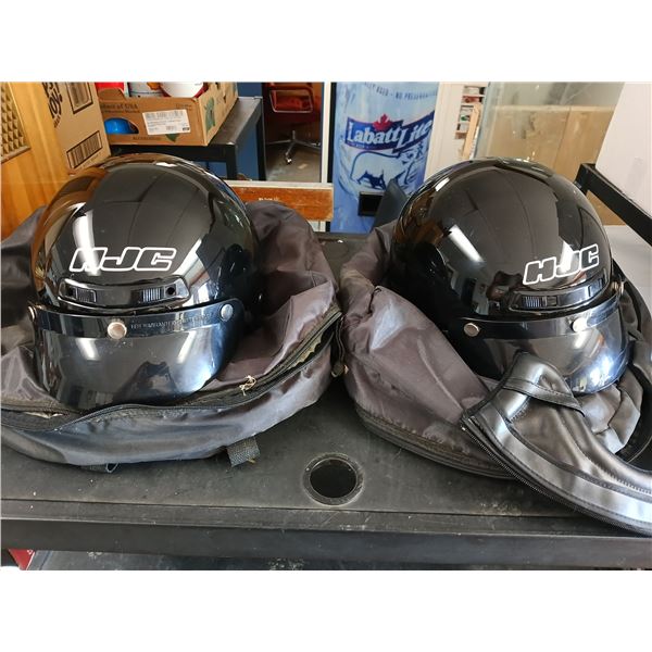 2 small HJC helmets with bags and chin strap covers