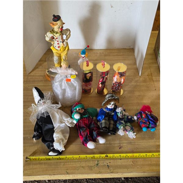 Collection of clown statues and dolls